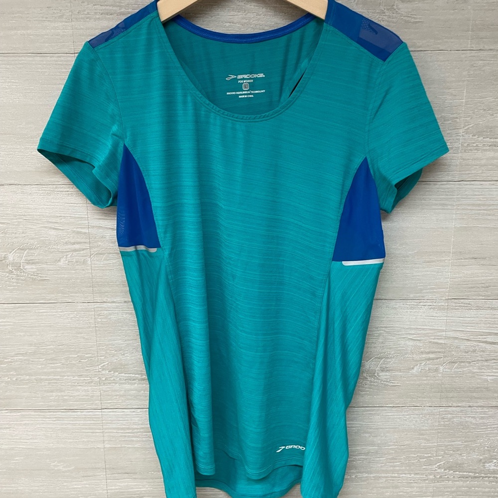 * | Brooks | running shirt. Size L.